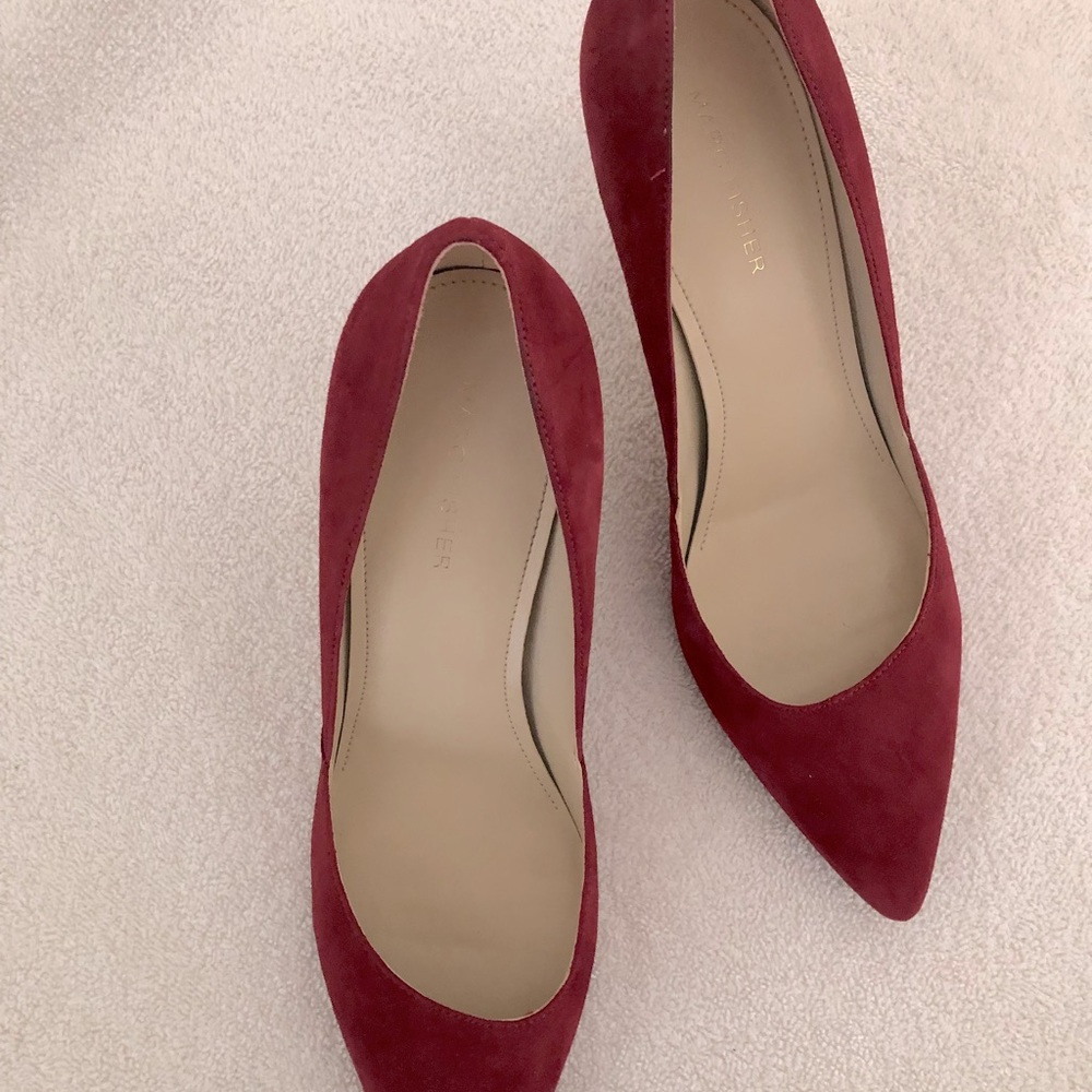 Red suede dress shoes.